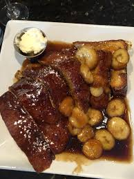 North Street Grille signature dishes Cinnamon Roll Pancakes, Lobster Benedict, Banana Bread French Toast